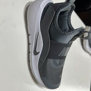 Nike Black and White Slip-On Sneakers